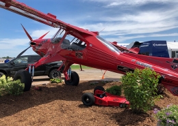 Red experimental STOL Bush airplane